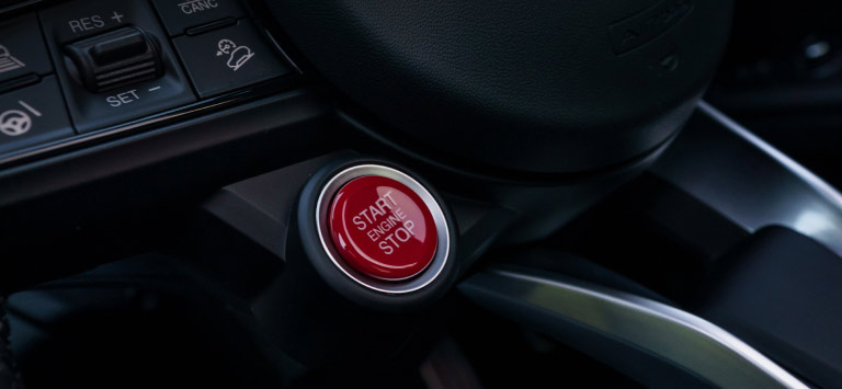giulia red engine start button