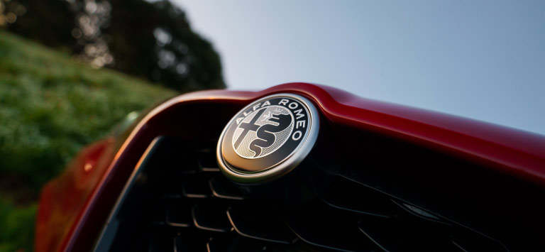 Monochrome front and rear “Alfa Romeo” badges