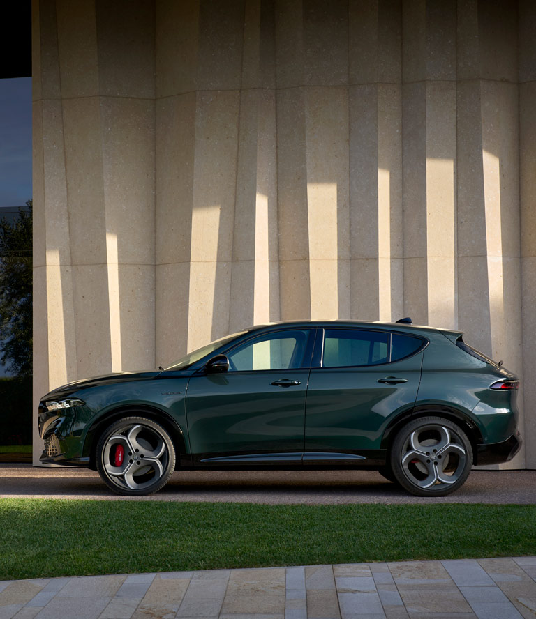 Dynamic Alfa Romeo Tonale Veloce in Misano Blu Driving On Road​