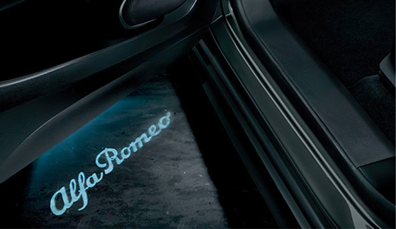 Alfa Romeo Logo On Floor Near Open Car Door